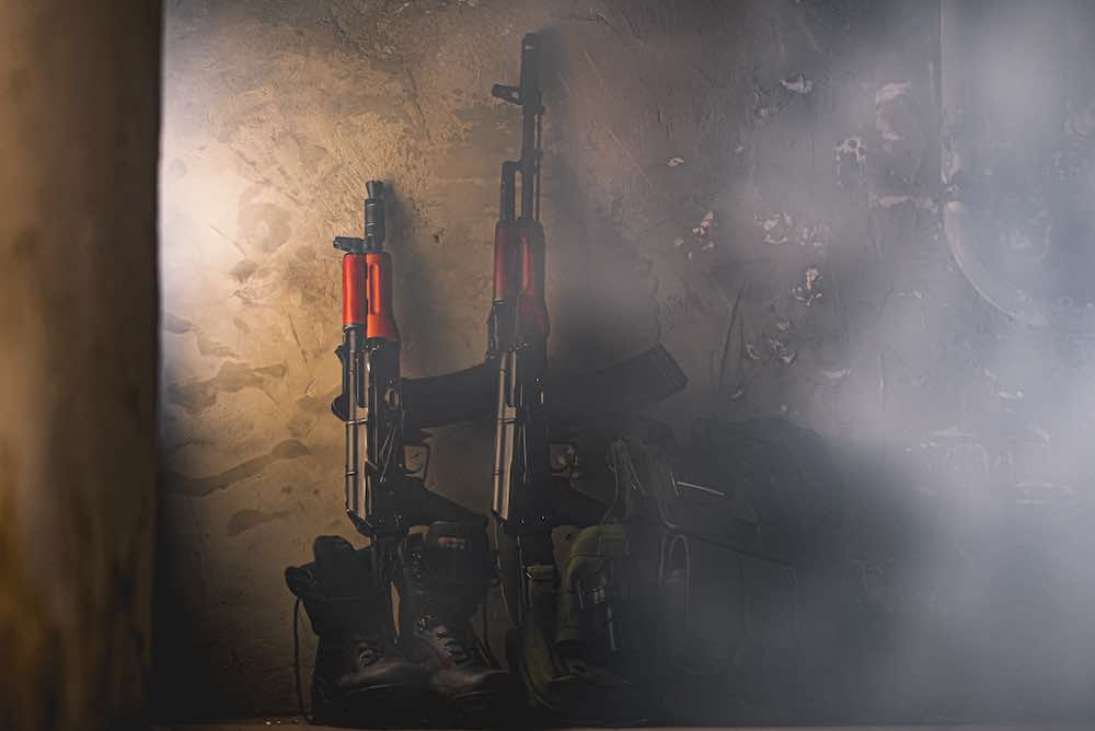 Kalashnikov weapons against the wall